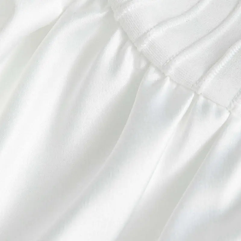 Elegantes Strickkleid mit Rüschen & Trompetenärmeln